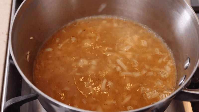 Vegetable stock added to rice.