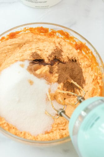 Add sugar and spice to pumpkin cream cheese mixture and beat.