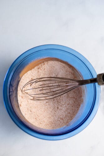 Whisk together cinnamon and sugar in mixing bowl.