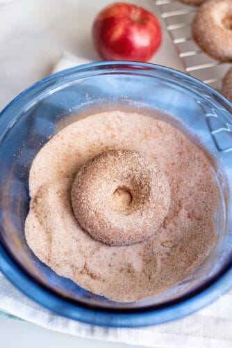 Toss donut in cinnamon sugar.