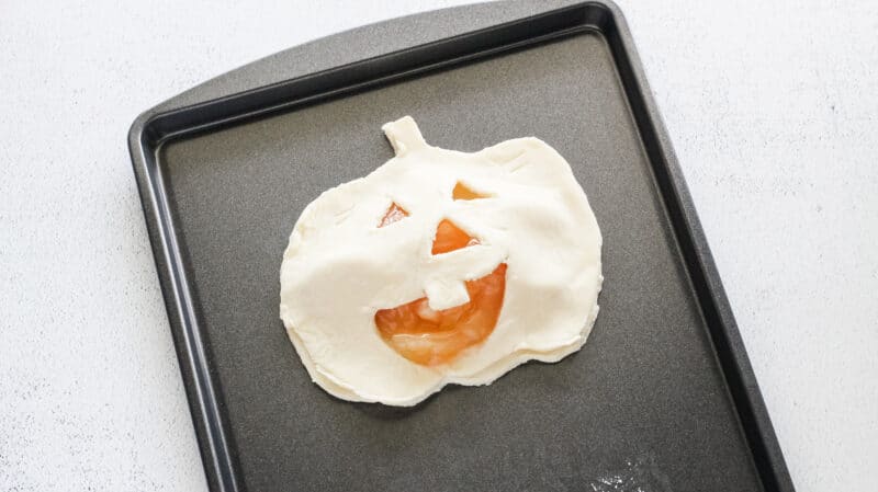 Place Jack-O-Lantern cut-out on top of the filling.