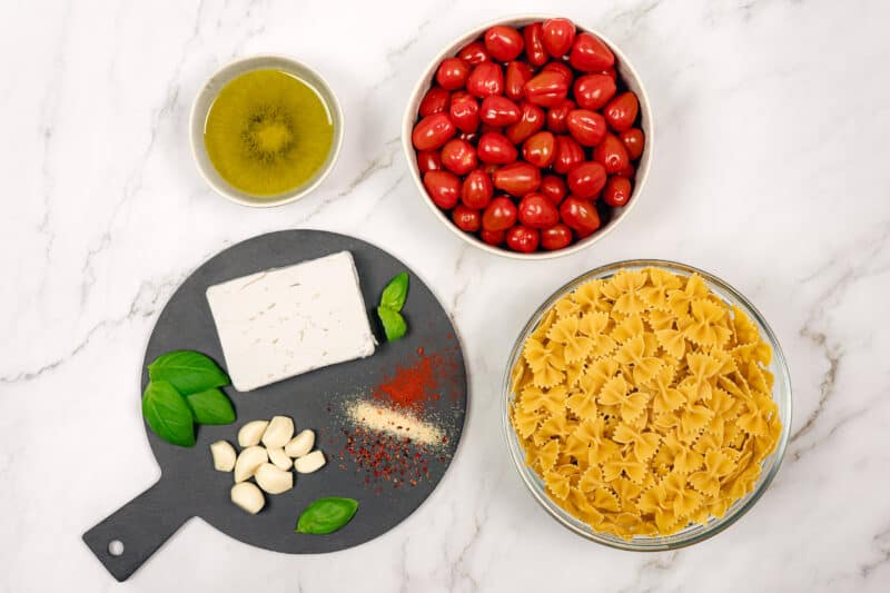 Recipe ingredients for feta and tomato pasta.