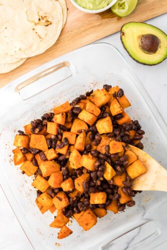 Gently mix sweet potatoes and black beans.