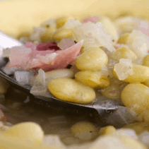 Spoonful of butter beans and ham.