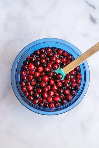 Stir syrup and cranberries.