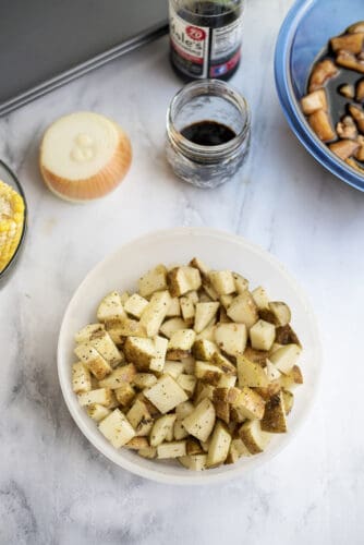 Toss potatoes with oil and seasoning.