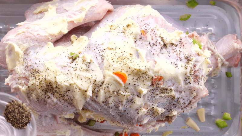 Cover turkey with salt and pepper.