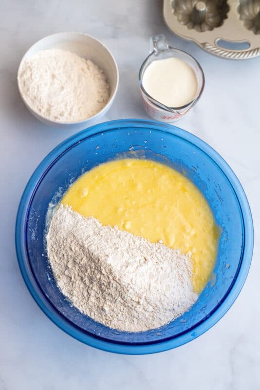 Add flour and whipped cream alternately to cake batter.