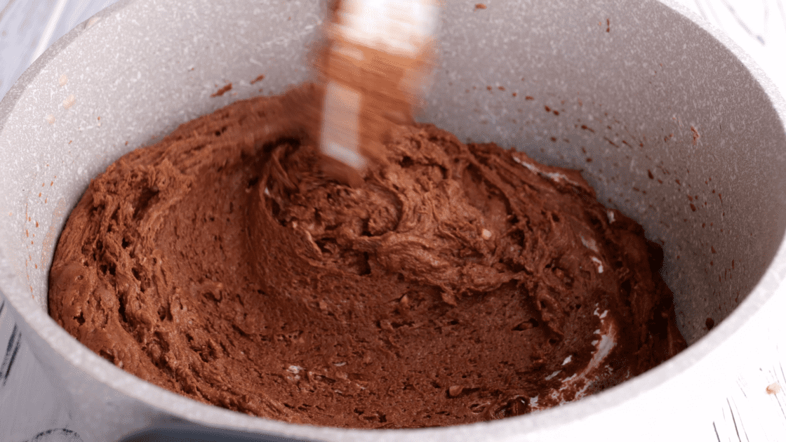 Mix together until chocolate chips melt and it becomes a chocolate fudge consistency.