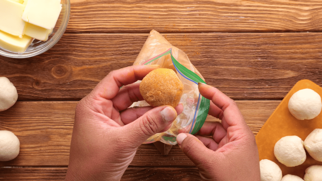 Dough ball covered in cinnamon sugar.