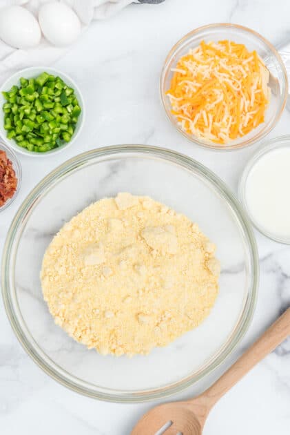 Add cornbread mix to mixing bowl.