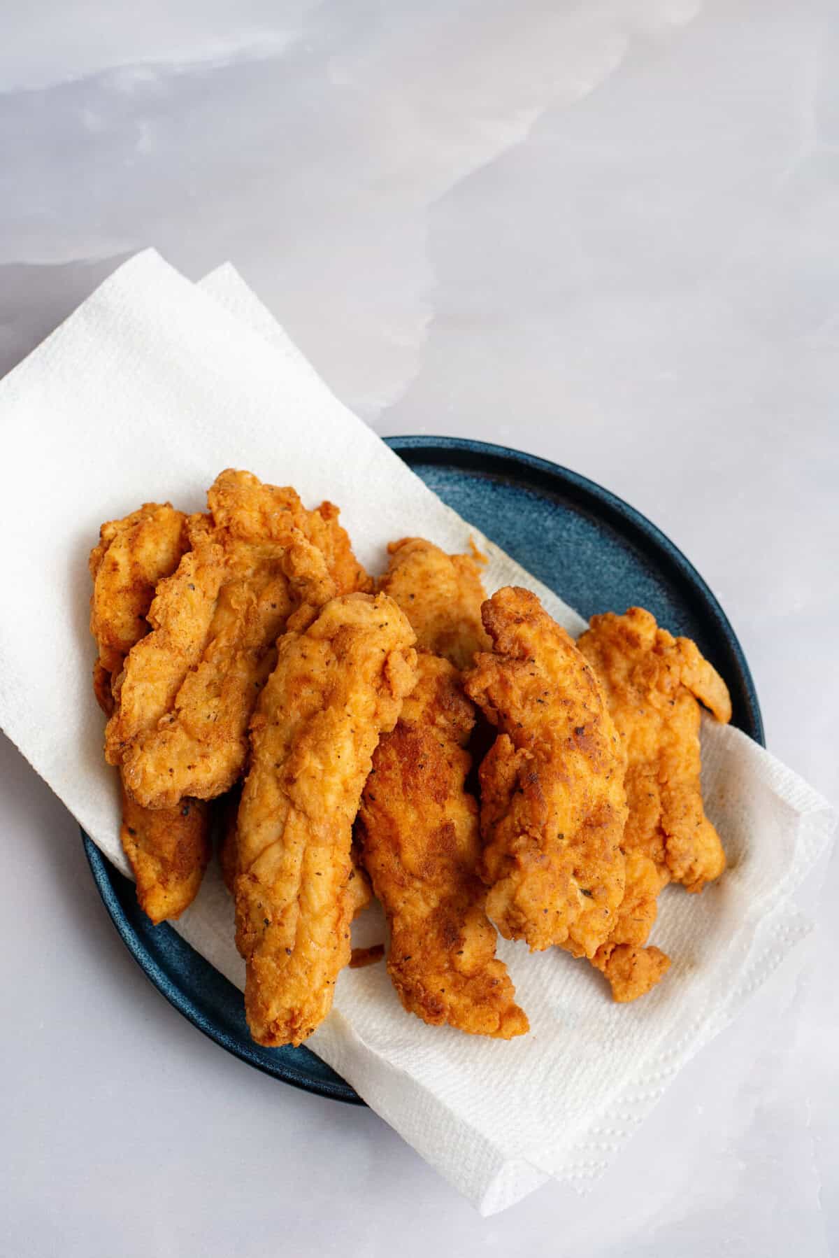 Remove tenders to paper-towel lined plate