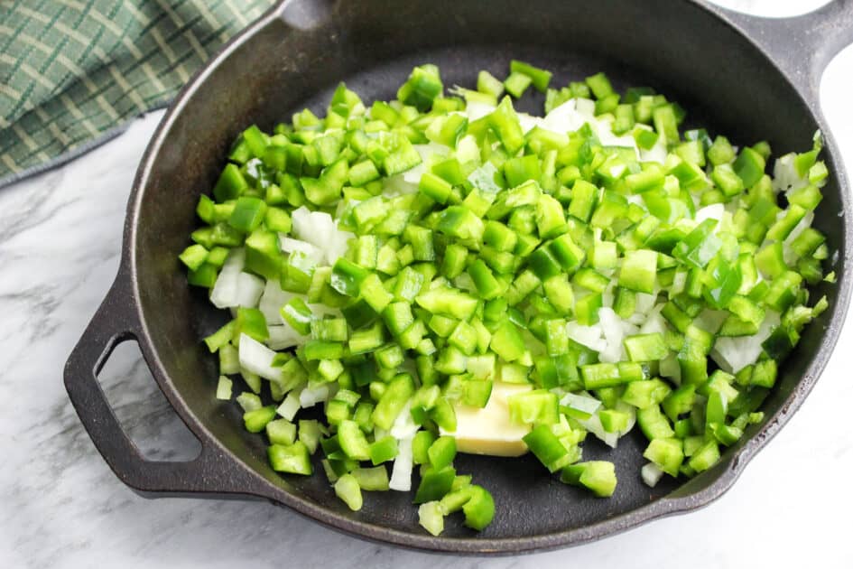 Add vegetables to skillet.