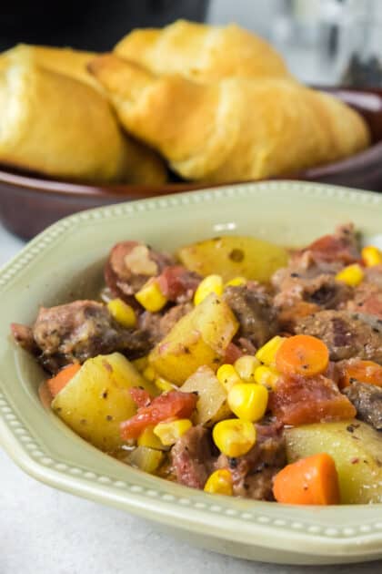 Bowl of sausage and beef stew.