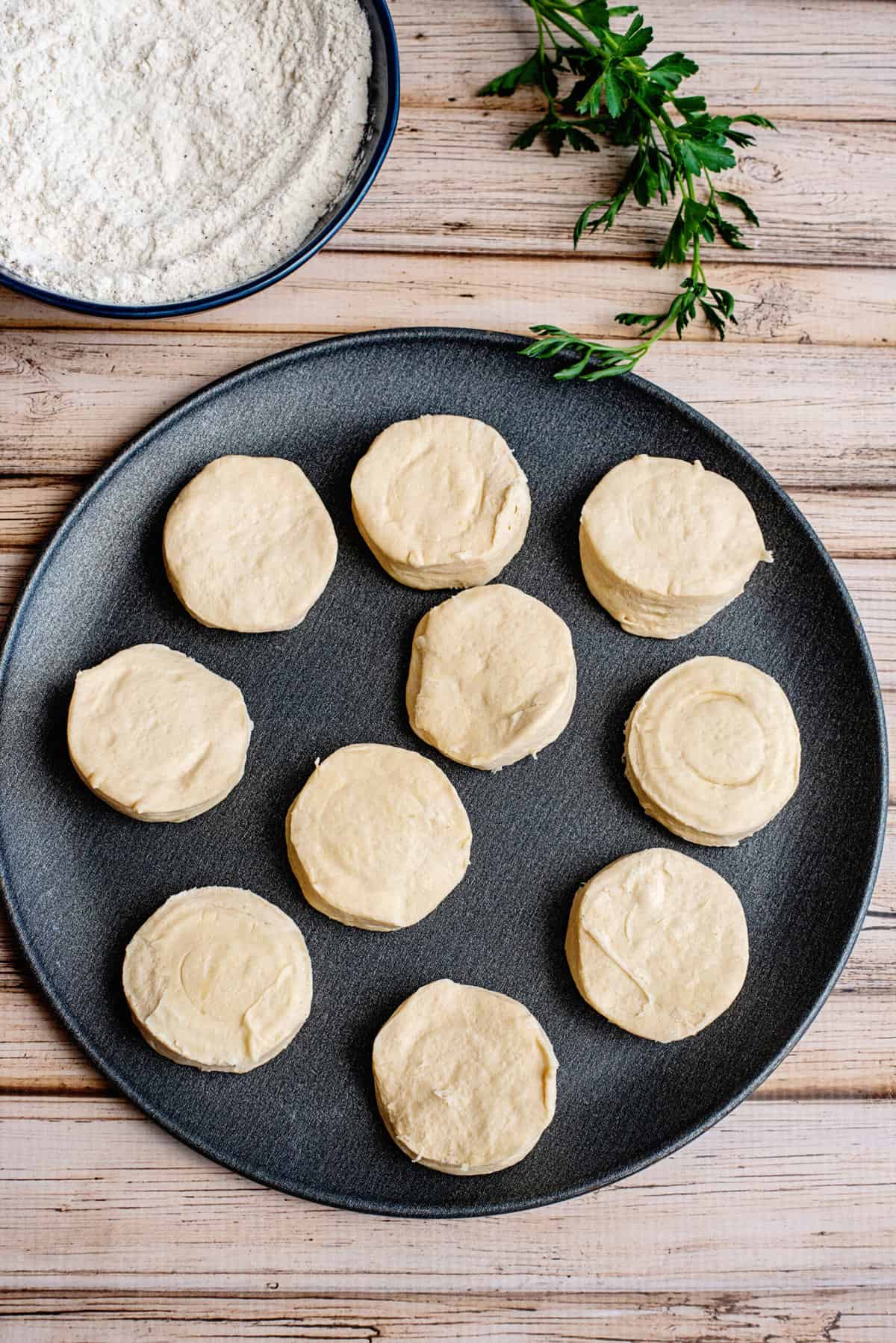 put biscuits onto a plate