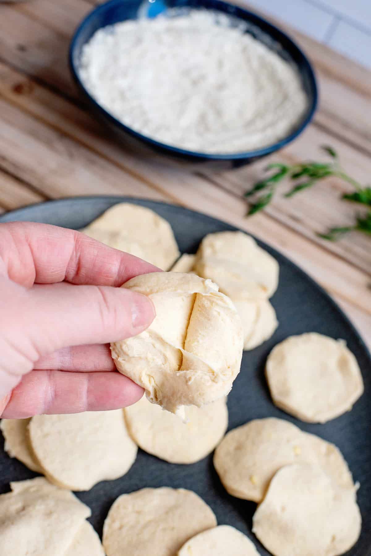 tear each biscuit into 3 layers