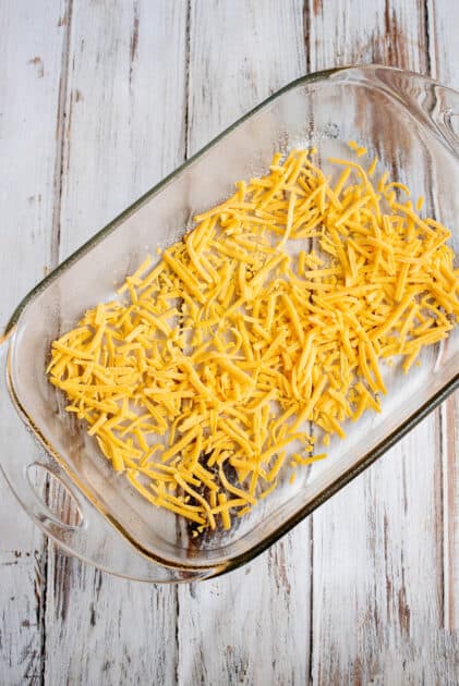 Add layer of shredded cheese.