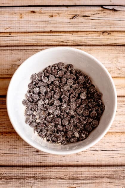 Toss chocolate chips in flour.