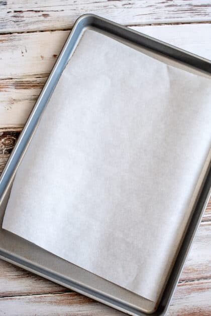 Line a baking sheet with parchment paper and set it to the side.