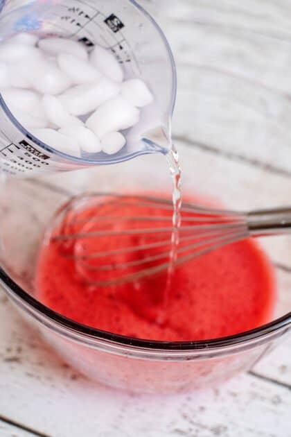 Add ice water to jello and stir.