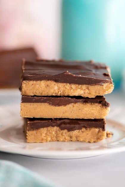 Stack of no-bake peanut butter bars.