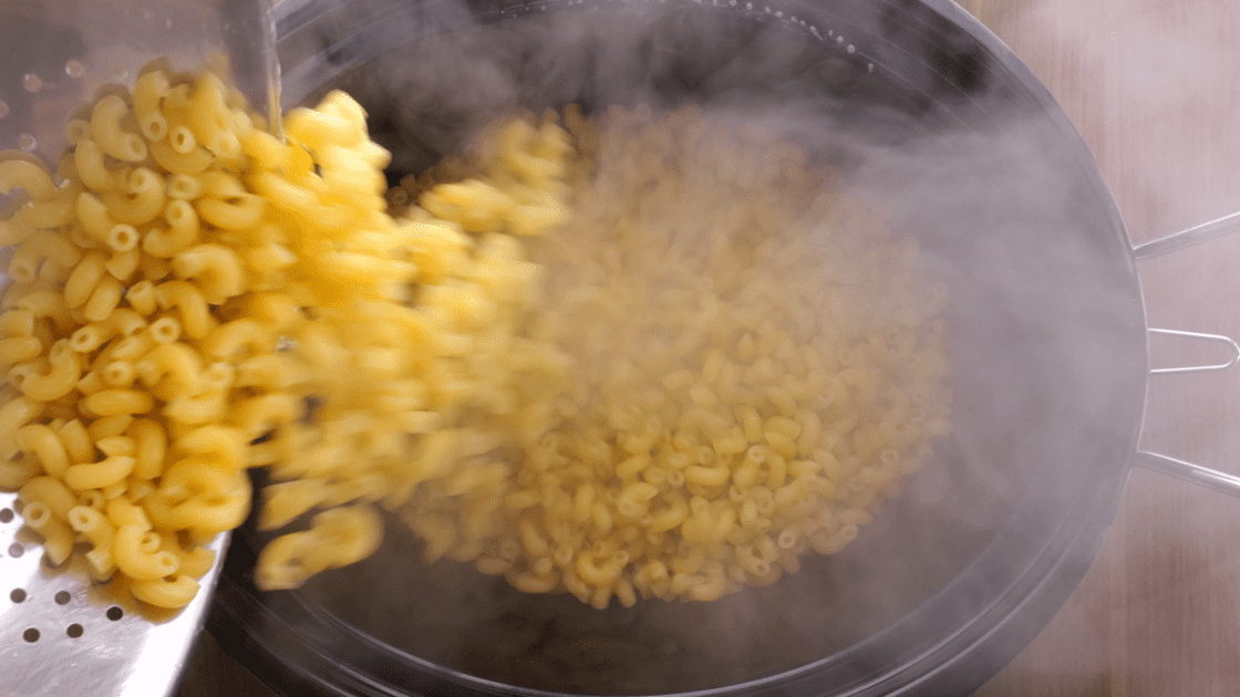 Add boiled pasta to the crockpot.