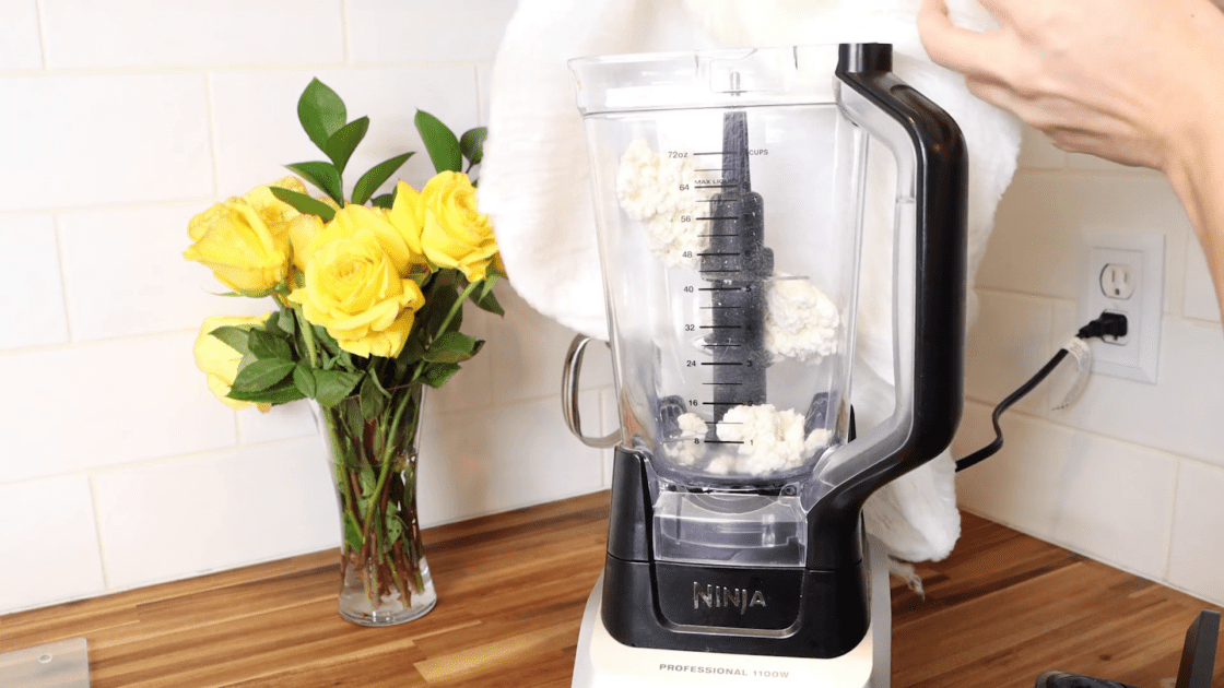 Transfer curds to food processor or blender.