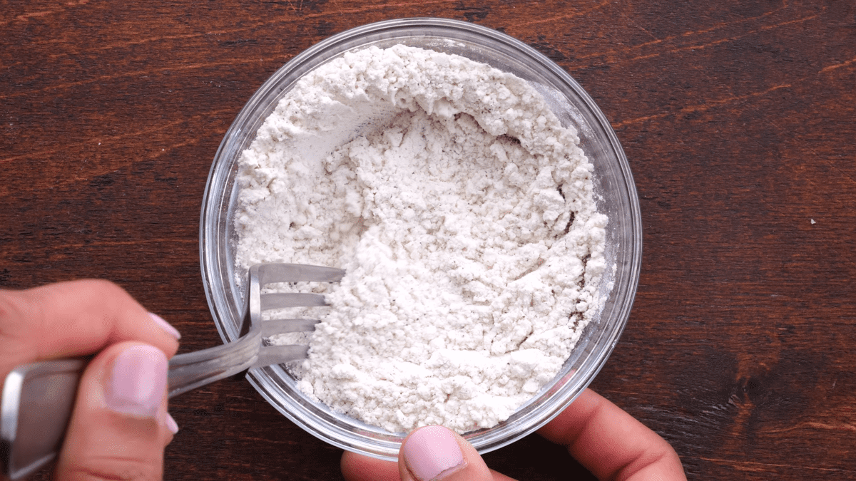 Mixing all of the dry ingredients together.