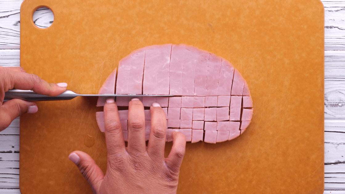 Chop up ham into cubes.