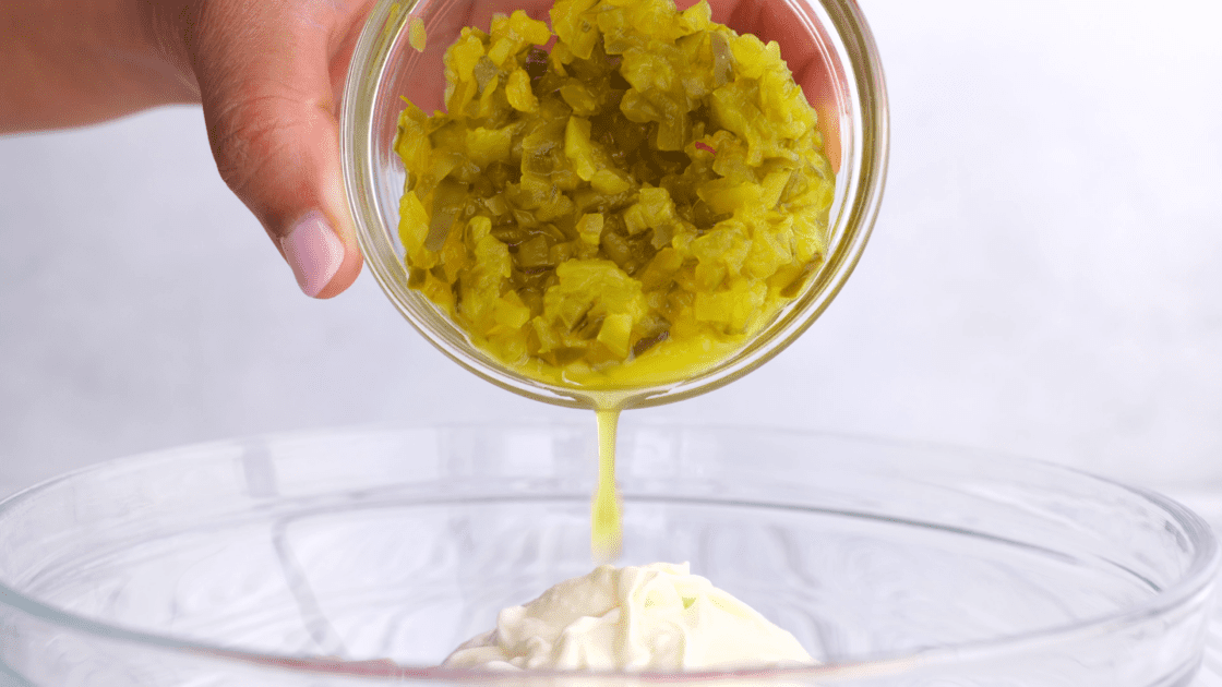 Add pickle relish to mixing bowl.