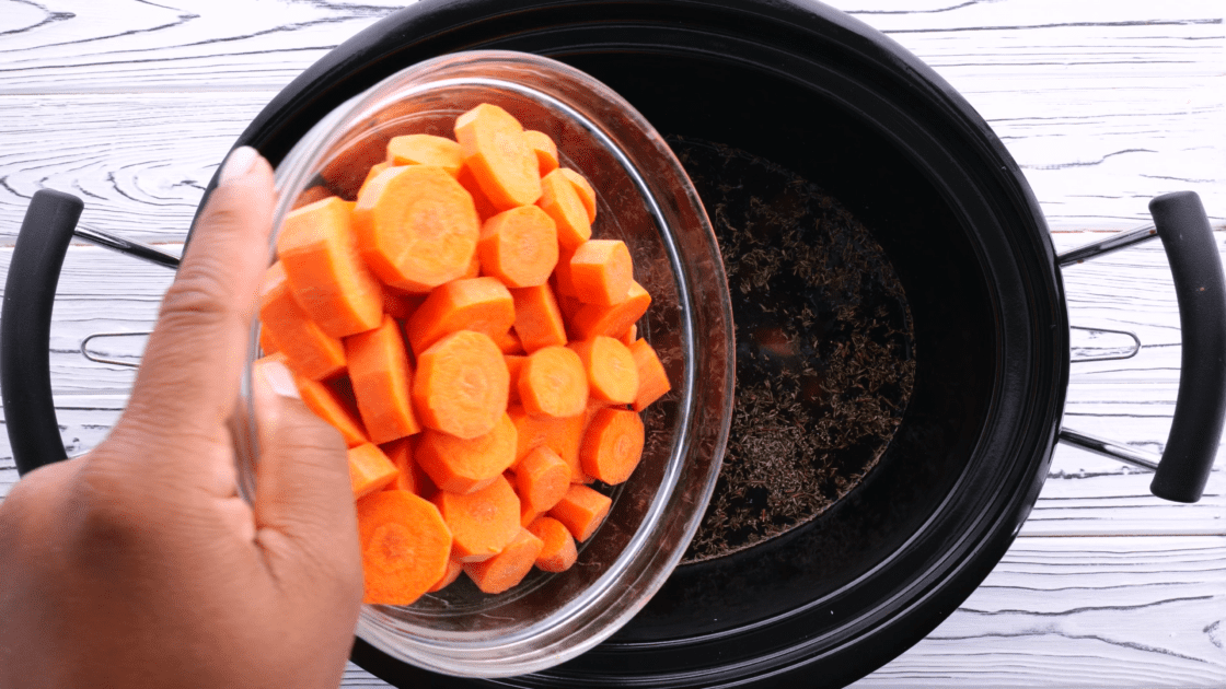 Add carrot to slow cooker.