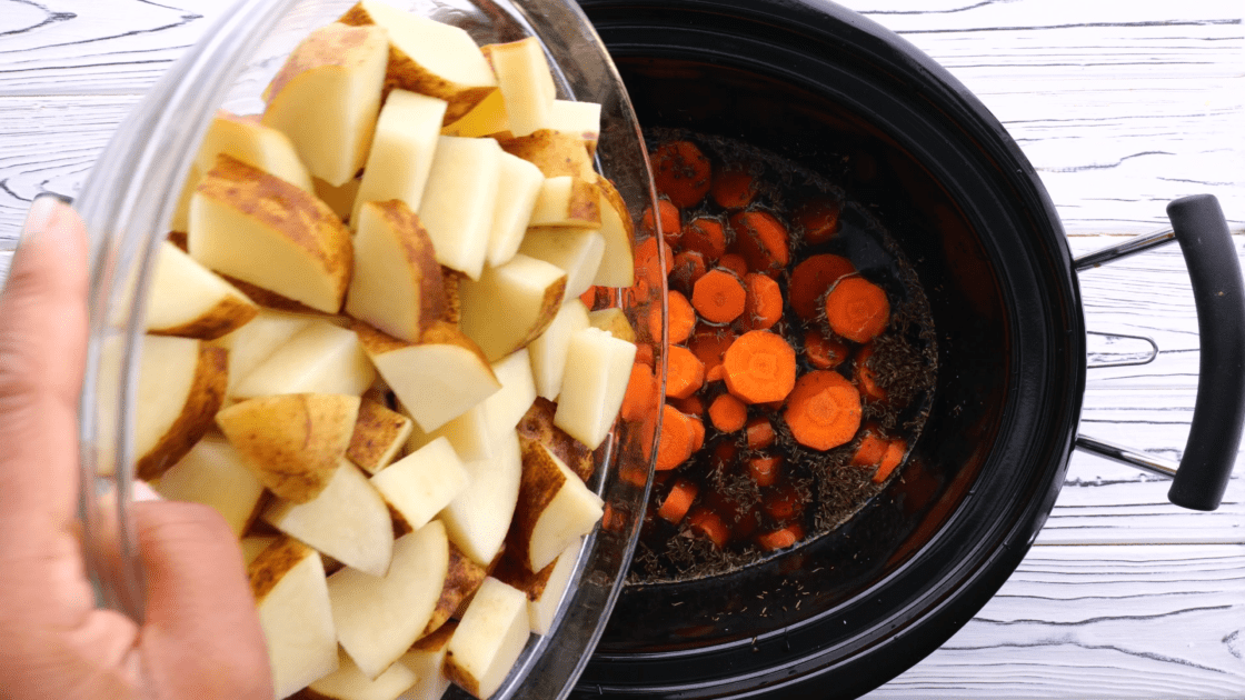 Add potatoes to slow cooker.
