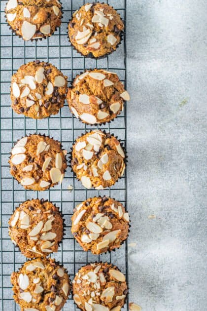 Cool banana nut muffins on a wire rack.