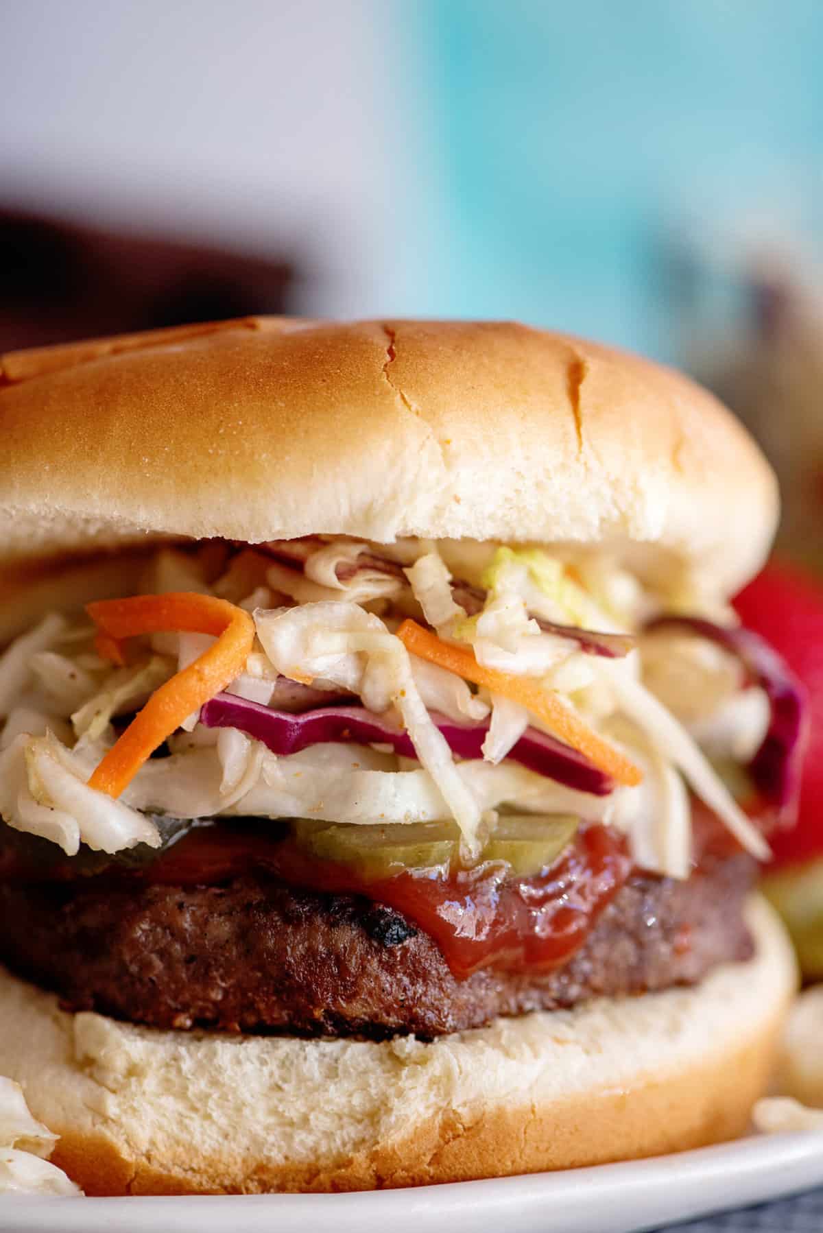 Close-up of burger slaw on a burger.