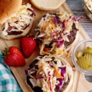 Burger slaw on burgers without buns on top.