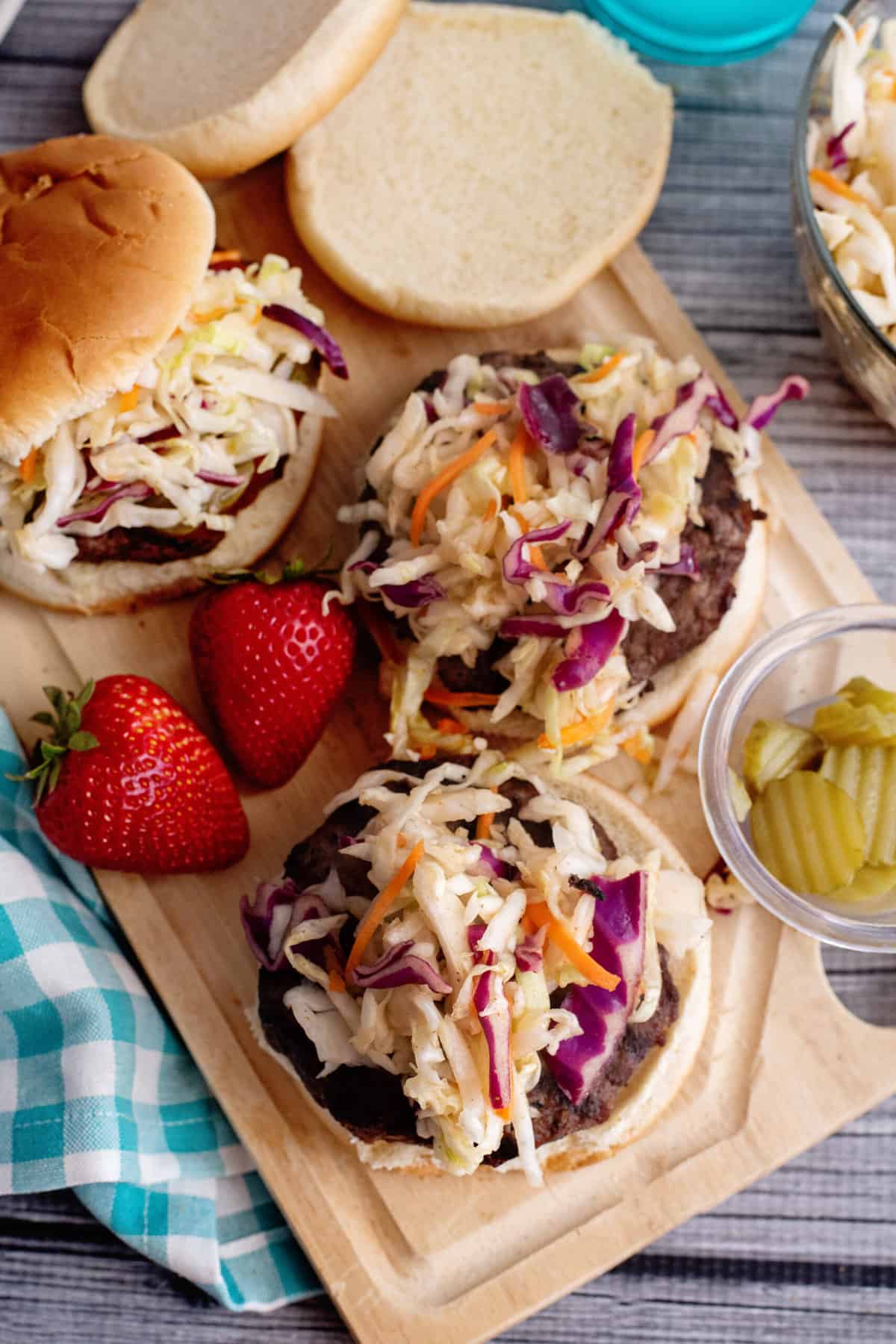 Burger slaw on burgers without buns on top.