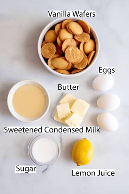 Labeled ingredients for lemon meringue pie with condensed milk.