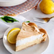 Slice of lemon meringue pie with condensed milk.