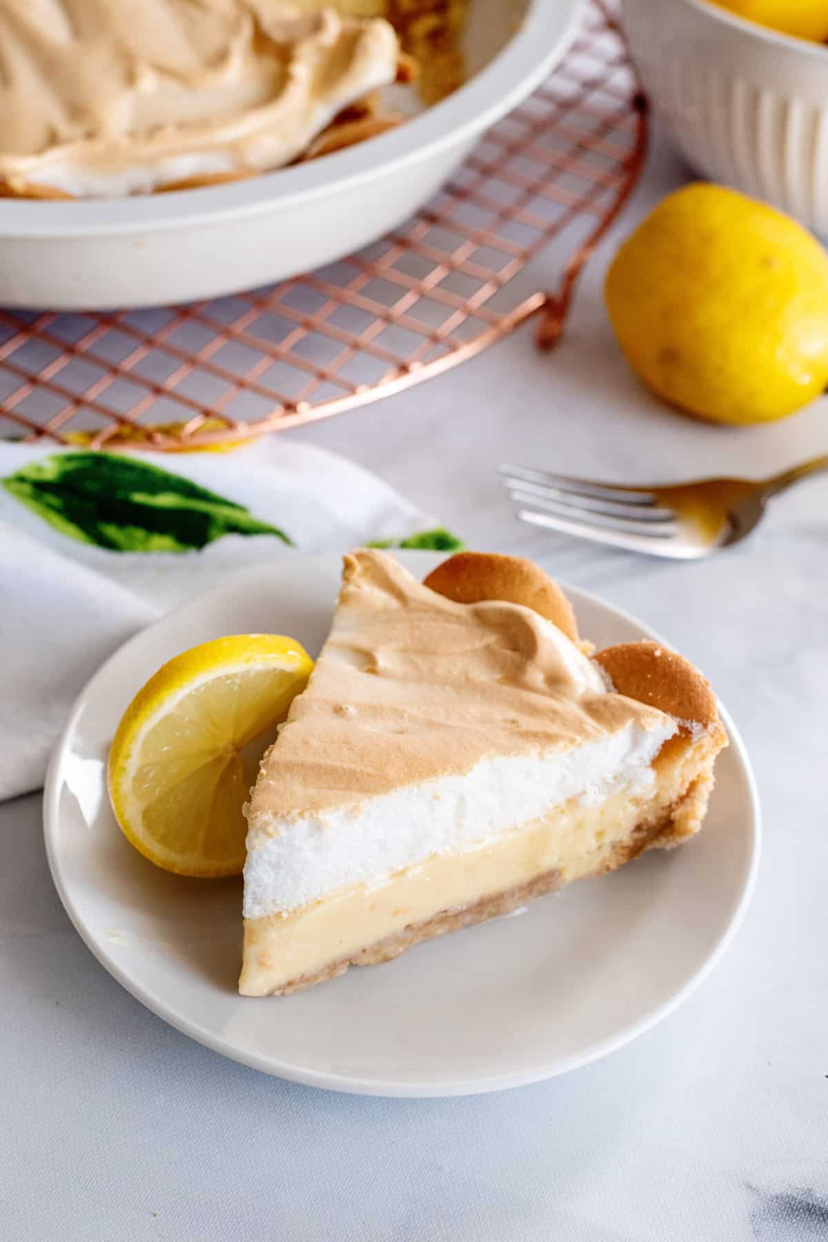 Slice of lemon meringue pie with condensed milk.