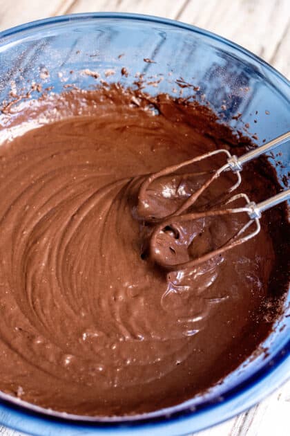 Mix chocolate velvet cake batter at medium speed.