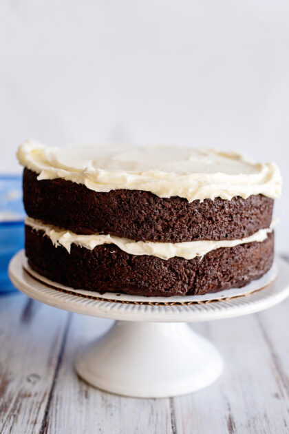 Spread icing over top cake layer.