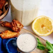 Alabama white barbecue sauce surrounded by ingredients.