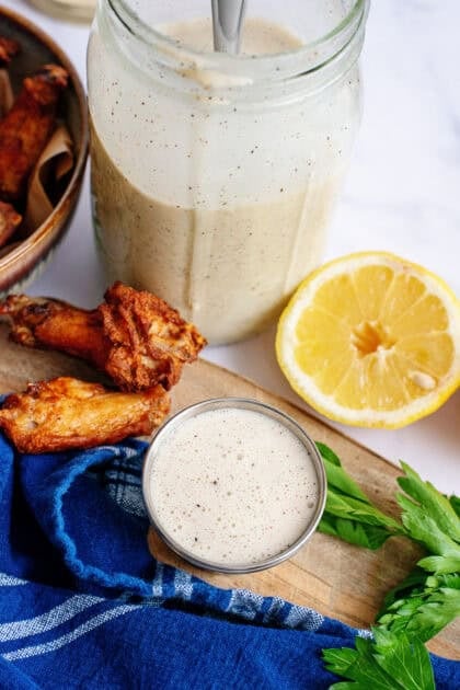 Alabama white barbecue sauce surrounded by ingredients.