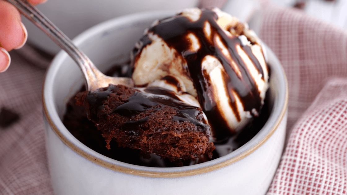 Spoonful of microwave brownie.