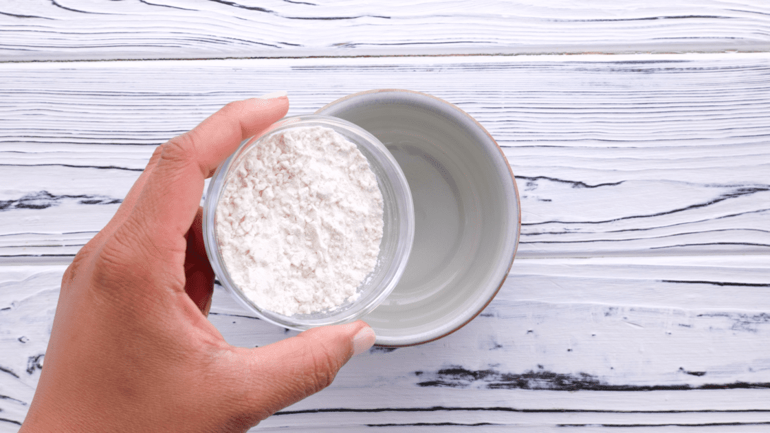 Add flour to mug.