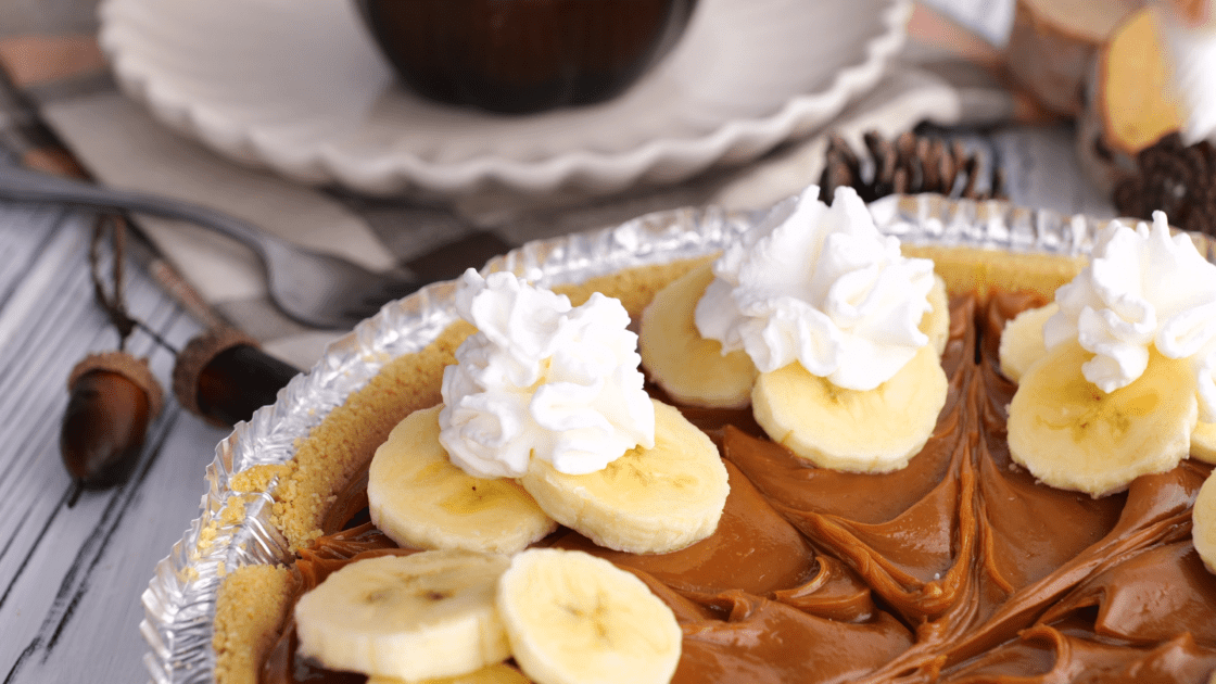 Add dollop of whipped cream to each pie slice.