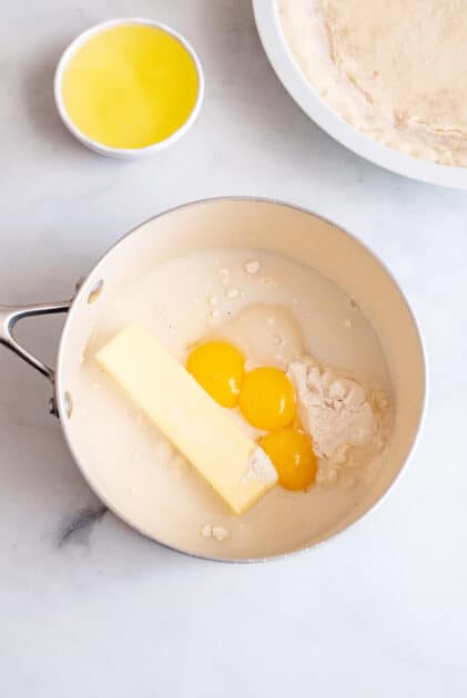 Add yolks only to saucepot.