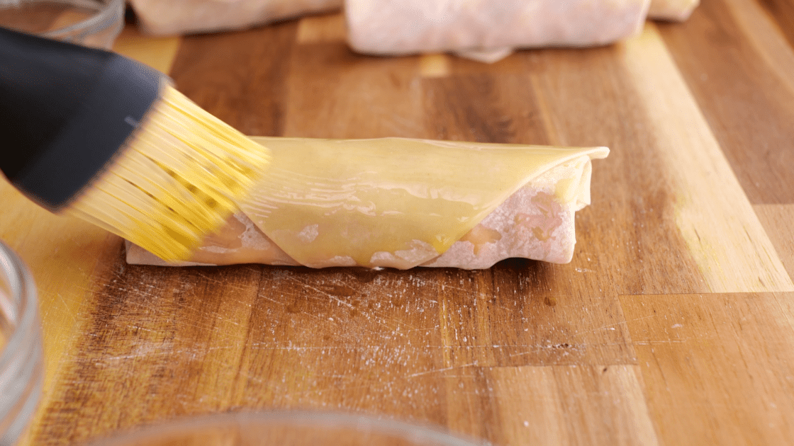 Brush pizza rolls with olive oil.