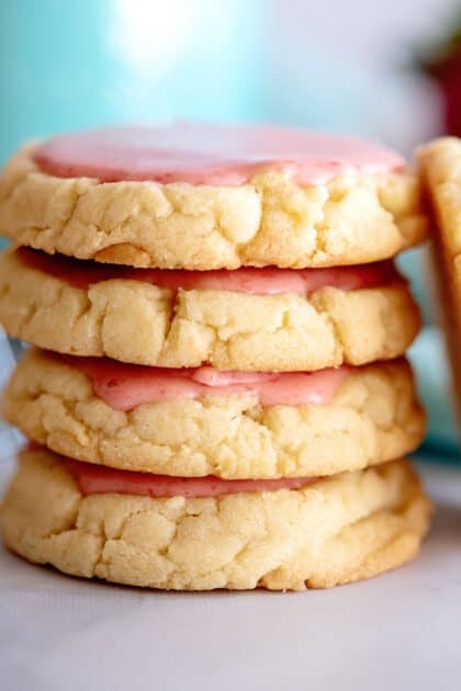 Stack of strawberry frosted cookies