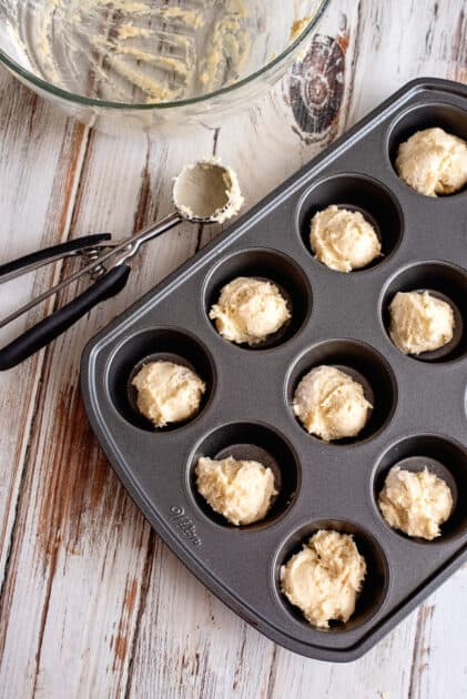 Fill each muffin cup with batter.